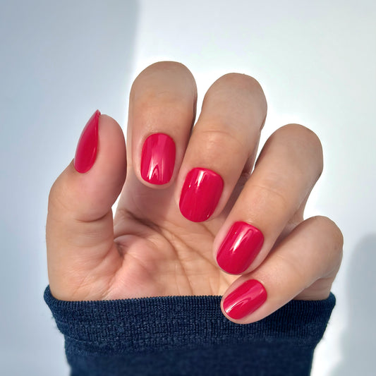Cherry Rouge Petite extra short round press-on nails in deep cherry red. Red, shiny and glossy. 
